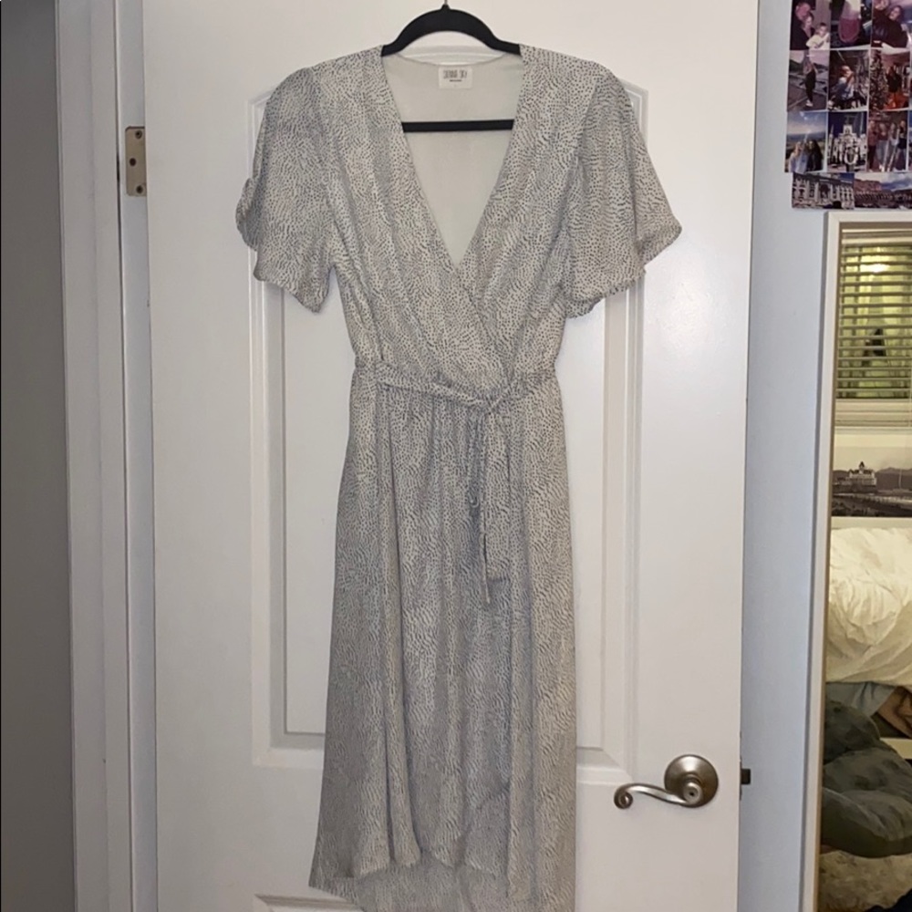 Black and white polkadot wrap dress